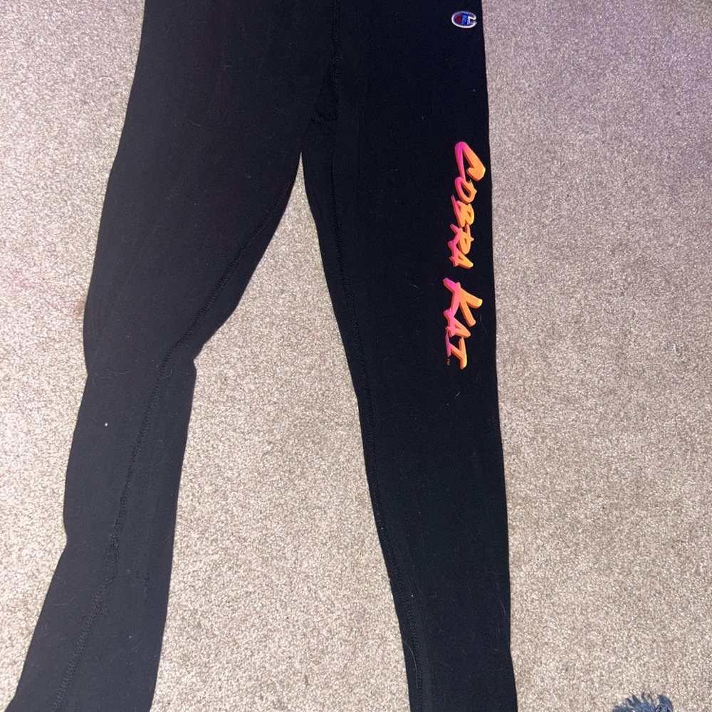 Champion Black Leggings with Vertical Text Design